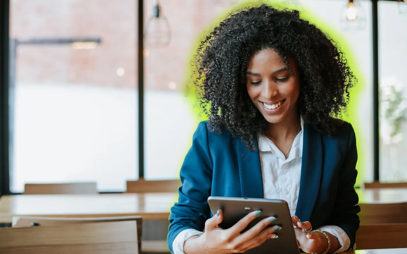 woman on tablet looking at online banking