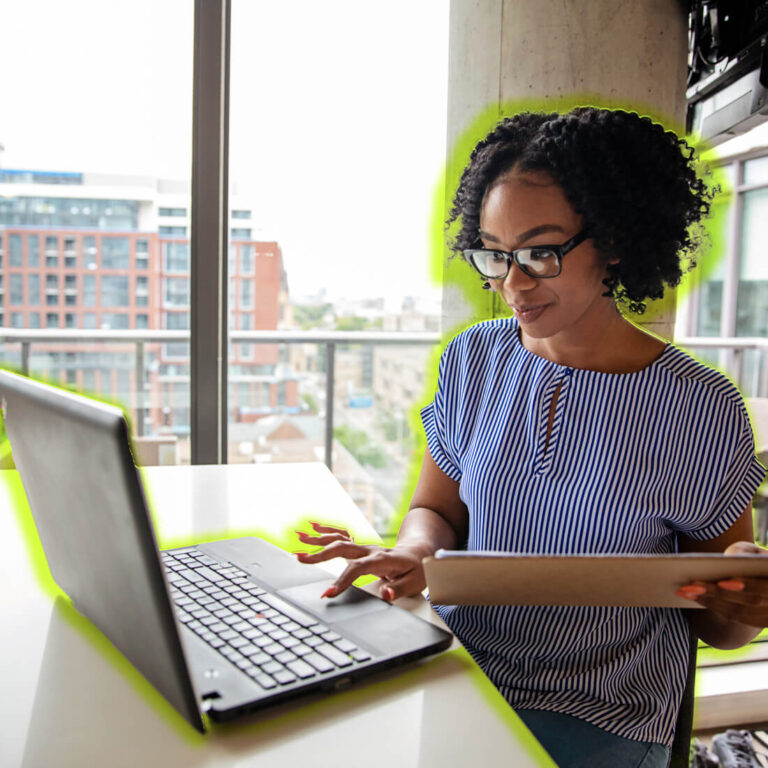 Business woman using a laptop image