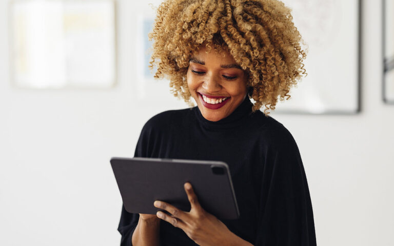 African American professional woman on tablet image