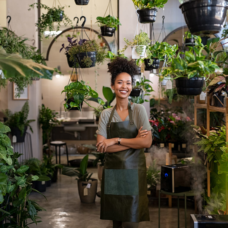 Woman working in plant flower shop image
