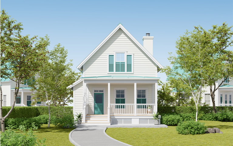 A new small, two-story home with a well-manicured lawn.